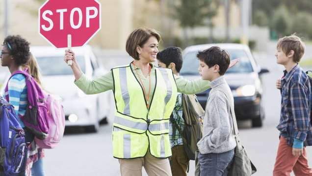 Illustration for article titled 8 Local Crossing Guards I’ve Got Wrapped Around My Little Finger
